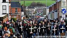 People take part in a Republican walk of remembrance to mark the 50th anniversary of 'Bloody Sunday', in Londonderry, Northern Ireland, January 30, 2022. REUTERS/Clodagh Kilcoyne
