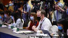 (210525) -- BEIJING, May 25, 2021 (Xinhua) -- A journalist asks questions at a press conference on Xinjiang-related issues held in Beijing, capital of China, May 25, 2021. TO GO WITH China's Xinjiang denounces so-called Uygur tribunal as trampling of int'l law (Xinhua/Xing Guangli)