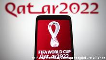 November 20, 2021, Ukraine: In this photo illustration, FIFA World Cup Qatar 2022 logo is seen on a smartphone screen. (Credit Image: © Pavlo Gonchar/SOPA Images via ZUMA Press Wire