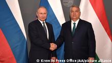 BUDAPEST, HUNGARY - OCTOBER 30: (----EDITORIAL USE ONLY Äì MANDATORY CREDIT - KREMLIN PRESS OFFICE / HANDOUT - NO MARKETING NO ADVERTISING CAMPAIGNS - DISTRIBUTED AS A SERVICE TO CLIENTS----) Russian President Vladimir Putin (L) and Prime Minister of Hungary, Viktor Orban (R) hold a joint press conference in Budapest, Hungary on October 30, 2019. Kremlin Press Office / Handout / Anadolu Agency