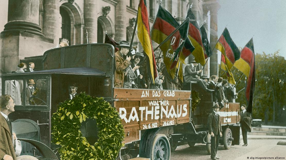 Funeral of Walther Rathenau 1923 with people bearing the flags