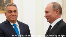 Hungarian Prime Minister Viktor Orban (L) speaks with Russian President Vladimir Putin during their meeting in the Kremlin in Moscow, on September 18, 2018. (Photo by Alexander Zemlianichenko / POOL / AFP) (Photo credit should read ALEXANDER ZEMLIANICHENKO/AFP via Getty Images)