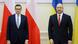 Poland's Prime Minister Mateusz Morawiecki and Ukraine's Prime Minister Denis Shmygal pose for media before their meeting in Kyiv, Ukraine Poland's Prime Minister Mateusz Morawiecki and Ukraine's Prime Minister Denis Shmygal pose for media before their meeting in Kyiv, Ukraine