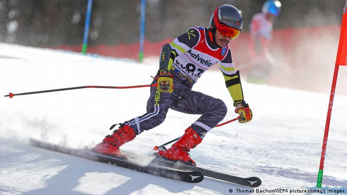 Skier Yassine Aouich from Marokko competes during a skiing event in Italy