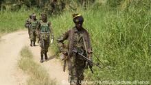 (211212) -- , Dec. 12, 2021 (Xinhua) -- Soldiers are seen during a joint military operation against armed forces in Beni territory, northeastern Democratic Republic of the Congo, Dec. 11, 2021. The Armed Forces of the Democratic Republic of the Congo (FARDC) and Uganda People's Defense Force (UPDF) on Saturday released the first assessment of their joint military operations against rebels of the Allied Democratic Forces (ADF), conducted since Nov. 30 in Beni territory, northeastern DRC. TO GO WITH: DR Congo, Uganda declare calm situation in northeastern DRC following assessment of joint military operations (Photo by Alain Uaykani/Xinhua)