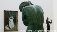 epa02084024 The bronze statues 'Eva' (C) and 'L'Age d'Airain' ('The iron age') (R) by French sculptor Auguste Rodin, and the painting 'Lise A l'Ombrelle' (Lise With Umbrella, 1867) by French artist Pierre Auguste Renoir are displayed during the exhibition entitled 'Das schoenste Museum der Welt' ('The world's most beautiful museum') at the Folkwang Museum in Essen, Germany, 18 March 2010. The exhibition presents the main artworks of the Folkwang collection for the first time in 70 years from 20 March to 25 July 2010. EPA/ROLAND WEIHRAUCH