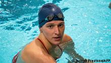 (FILES) In this file photo taken on January 22, 2022, US swimmer Lia Thomas, a transgender woman, finishes the 200-yard Freestyle for the University of Pennsylvania at an Ivy League swim meet against Harvard University in Cambridge, Massachusetts. - Thomas' controversial career as a transgender swimmer hung in the balance on February 2, 2022, after the collegiate body governing the sport announced new rules that could impact her ability to race competitively. USA Swimming said it created a new set of guidelines at the elite level for transgender athlete participation that relies on science and medical evidence-based methods to provide a level-playing field for elite cisgender women, and to mitigate the advantages associated with male puberty and physiology. (Photo by Joseph Prezioso / AFP)