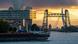 The De Hef Bridge in Rotterdam with the sun setting behind it The De Hef Bridge in Rotterdam with the sun setting behind it