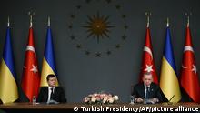 Turkish President Recep Tayyip Erdogan, right, and Ukrainian President Volodymyr Zelenskiy speak during a joint news conference following their talks, in Istanbul, Friday, Oct. 16, 2020. President Zelenskiy is in Istanbul for a one-day working visit. (Turkish Presidency via AP, Pool)
