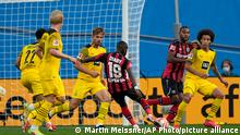 Leverkusen's Moussa Diaby scores his side's third goal during the German Bundesliga soccer match between Bayer Leverkusen and Borussia Dortmund in Leverkusen, Germany, Saturday, Sept. 11, 2021. (AP Photo/Martin Meissner)