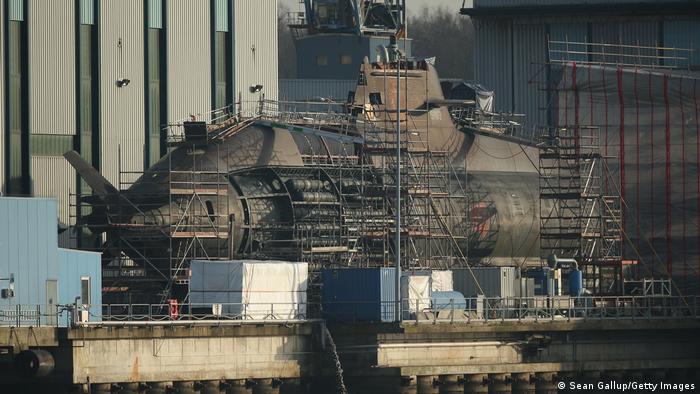 A military submarine stands in dry dock under construction at the ThyssenKrupp Marine Systems GmbH shipyard in Kiel, Germany