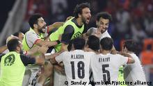 Egypt team players celebrate after a penalty shootout during the African Cup of Nations 2022 semi-final soccer match between Cameroon and Egypt at the Olembe stadium in Yaounde, Cameroon, Thursday, Feb. 3, 2022. (AP Photo/Sunday Alamba)
