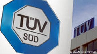 TUEV SUED's logo before one of its buildings TUEV SUED's logo before one of its buildings