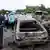 Ausgebrannte Autos nach der Explosion in Nigeria (Foto: ap)