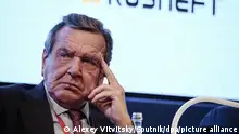 6683776 28.10.2021 Former German chancellor and chairman of the Rosneft board Gerhard Schroeder attends a session of the 14th Eurasian Economic Forum in Verona, Italy. Alexey Vitvitsky / Sputnik