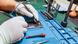 Damaged cellular phone being repaired Damaged cellular phone being repaired