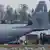 A Hercules transport aircraft is seen on the tarmac at Jasionka Airport near Rzeszow, Poland