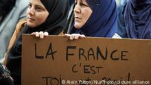 27.10.2019
A woman with a headscarf holds a placard reading 'France: it's you and me'. People gathered against islamophobia on the main square of Toulouse, the Capitole. They denounce what they perceive as stigmatization of the islamic faith as President Macron called for a 'society of vigilance' to detect 'little signs' which are said to announce a radicalization such as 'being interesting in international news', 'stop drinking alcohol', etc. Gatherers also denounce an intolerance to the Muslim headscarf in public places. Toulouse. France. October 27th 2019. (Photo by Alain Pitton/NurPhoto)
