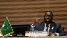 Senegal President, Macky Sall, the new chairperson of the African Union (AU) takes questions from the media during the closing ceremony of the 35th ordinary session of the assembly of the African Union in Addis Ababa, Ethiopia on February 6, 2022 (Photo by Tony KARUMBA / AFP) (Photo by TONY KARUMBA/AFP via Getty Images)