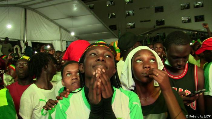 Students at the Cheikh Anta Diop University nervously watch the AFCON final from Dakar