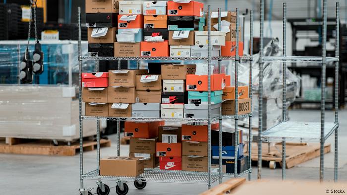 A rack with boxes of old sneakers