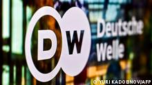 A photograph taken on February 3, 2022 shows the logo of German broadcaster Deutsche Welle on a laptop screen in Moscow. - Russia said German broadcaster it is closing the Moscow bureau of German broadcaster Deutsche Welle and revoking staff accreditations in Russia, in response to Berlin's ban on the German-language channel of Russian state TV network RT. (Photo by Yuri KADOBNOV / AFP)