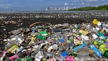 Garbage, including plastic waste, is seen at the beach of Costa del Este, in Panama City, on April 19, 2021. - Every two weeks, Marine Biology students descend about five meters in the sea to take care of a coral nursery of the staghorn species (Acropora cervicornis) in Portobelo, Panama, with which they aim to restore reefs damaged by climate change and pollution, as part of the Reef2Reef project. (Photo by Luis ACOSTA / AFP) (Photo by LUIS ACOSTA/AFP via Getty Images)