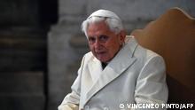 (FILES) In this file photo taken on December 08, 2015 Pope Emeritus Benedict XVI is pictured at St Peter's basilica in The Vatican before the opening of the Holy Door by Pope Francis to mark the start of the Jubilee Year of Mercy. - Former pope Benedict XVI failed to stop four clergymen accused of child sex abuse in the Catholic Church in Munich, the law firm that carried out a key probe said on January 20, 2022. The ex-pontiff -- who was the archbishop of Munich and Freising from 1977 to 1982 -- has strictly denied any responsibility, said lawyer Martin Pusch of Westpfahl Spilker Wastl which was tasked by the church to carry out the probe. (Photo by Vincenzo PINTO / AFP)