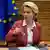 European Commission President Ursula von der Leyen rings a bell