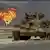 Bangkai sebuah tank Irak dilatari ladang minyak yang dibakar militer dalam invasi Kuwait, 1990