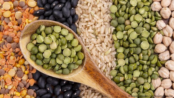 A display of dried grains and peas