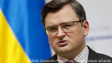 Ukrainian Foreign Minister Dmytro Kuleba speaks to the media during a joint news conference with German Foreign Minister Annalena Baerbock following their talks in Kyiv, Ukraine, Monday, Feb. 7, 2022. (Gleb Garanich/Pool Photo via AP)