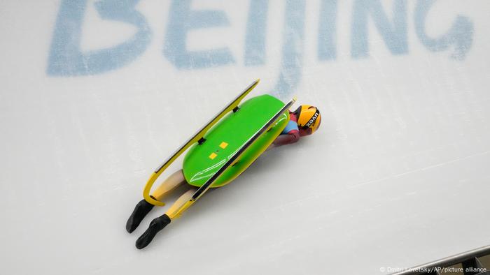 Julia Taubitz falls from her luge on to track at the Beijing Winter Olympics