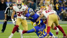San Francisco 49ers' Elijah Mitchell (25) runs during the second half of the NFC Championship NFL football game against the Los Angeles Rams Sunday, Jan. 30, 2022, in Inglewood, Calif. (AP Photo/Elaine Thompson)