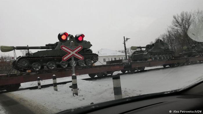 Armored personnel carriers being transported by rail through the snow to the Brestskiy training ground in Belarus