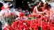 Two women looking at bouquets of roses on sale at a flower shop in Nairobi, Kenya Two women looking at bouquets of roses on sale at a flower shop in Nairobi, Kenya