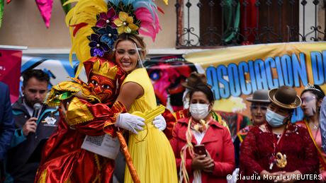 The carnival Queen embraces 'Pepino' to open the Carnival season in La Paz, Bolivia. 