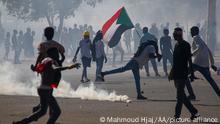 KHARTOUM, SUDAN - FEBRUARY 14: Security forces intervene in protesters during a protest demanding the Sovereignty Council, which is under military rule, be dissolved and the administration should be handed over to the civilians as soon as possible in Khartoum, Sudan on February 14, 2022. Mahmoud Hjaj / Anadolu Agency
