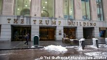 People walk by The Trump Building office building at 40 Wall Street in New York on Friday, Jan. 7, 2022. The New York attorney general’s office says, Tuesday, Jan. 18, its civil investigation has uncovered evidence that former President Donald Trump's company used “fraudulent or misleading” asset valuations to get loans and tax benefits. (AP Photo/Ted Shaffrey)