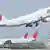 Japonya Havayollarına ait Boeing 747-400 yolcu uçağı