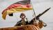 Soldado com fuzil, sob bandeira da Alemanha