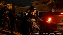 Members of the police special forces arrive at the home of former Honduran President Juan Orlando Hernandez in Tegucigalpa on February 14, 2022. - The United States has asked Honduras to extradite its former president Juan Orlando Hernandez, who left office last month and is suspected of drug trafficking, a source close to the matter told AFP Monday. The Honduran Foreign Ministry had said earlier on Twitter that an official communication from the US Embassy had been sent to the Supreme Court formally asking for the provisional arrest of an unnamed Honduran politician for the purpose of extradition. (Photo by Orlando SIERRA / AFP) (Photo by ORLANDO SIERRA/AFP via Getty Images)