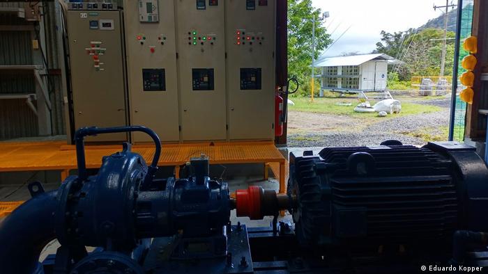 Hydraulic pumps in a computing centre of the crypto-mining facility of the Poas I hydroelectric power plant in Costa Rica 