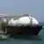 СПГ-танкер "Доха" в порта Рас-Лаффана - центра газовой промышленности Катара  