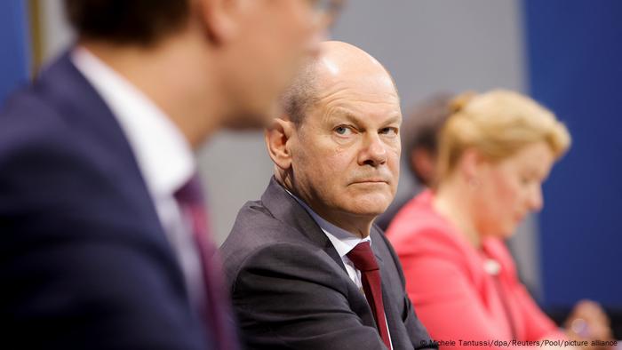 German Chancellor Olaf Scholz participates in a press conference with state leaders