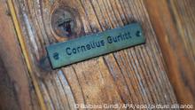 epa03936403 The owner's name is written on a small plate at the house of German art collector Cornelius Gurlitt in Salzburg, Austria, 05 November 2013. A private stash of 1,500 paintings that were seized by the Nazis, has been found in Germany, a news magazine said 03 November. Customs investigators found the missing art more than two years ago in a Munich apartment of 80-year-old Cornelius Gurlitt, but this was not disclosed at the time, the 'Focus' magazine reported. EPA/BARBARA GINDL ++
