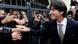 Der Trainer der deutschen Fussball-Nationalmannschaft, Joachim Löw (r.) schüttelt in Berlin nach der Verleihung des Verdienstordens der Bndesrepublik Deutschland die Hände der wartenden Fans vor dem Schloss Bellevue. (Foto: Oliver Lang/dapd) Der Trainer der deutschen Fussball-Nationalmannschaft, Joachim Löw (r.) schüttelt in Berlin nach der Verleihung des Verdienstordens der Bndesrepublik Deutschland die Hände der wartenden Fans vor dem Schloss Bellevue. (Foto: Oliver Lang/dapd)