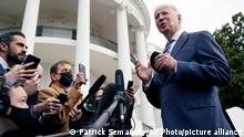 President Joe Biden speaks with members of the press before boarding Marine One on the South Lawn of the White House, Thursday, Feb. 17, 2022, in Washington. Biden is en route to Ohio to promote his infrastructure agenda. (AP Photo/Patrick Semansky)
