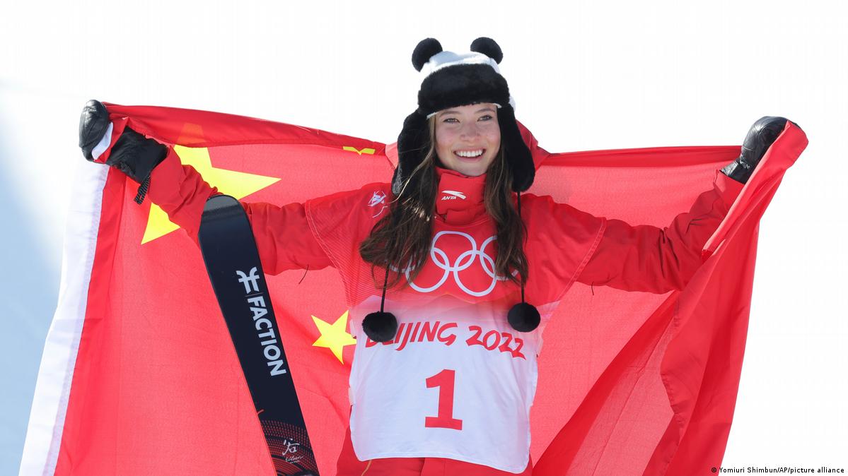 Olympic Skier & Model Eileen Gu Poses With Her Gold Medals in Red