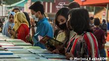 16/02/2022 *** Amar Ekushey Book Fair 2022, the annual event of booklovers and publishers, opened in Dhaka, Bangladesh on Tuesday. The book fair will remain open for visitors from 2pm to 9pm every working day, but the visitors will be allowed to enter the venue till 8:30pm. The visitors, publishers, stall owners and those who engaged in managing the fair need to be vaccinated.
Ekushey Book Fair, Dhaka, book fair, vaccine
Copyright: Mortuza Rashed
